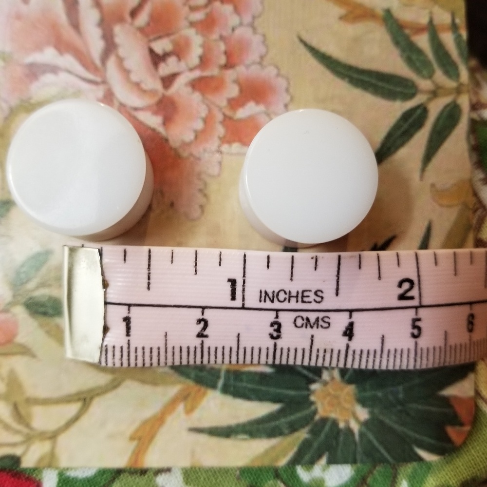 Handmade white plastic gauges. 5/8 inch
